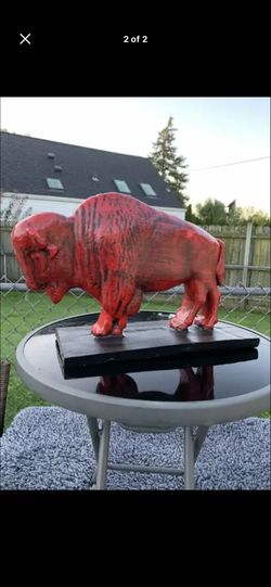 The red buffalo statue