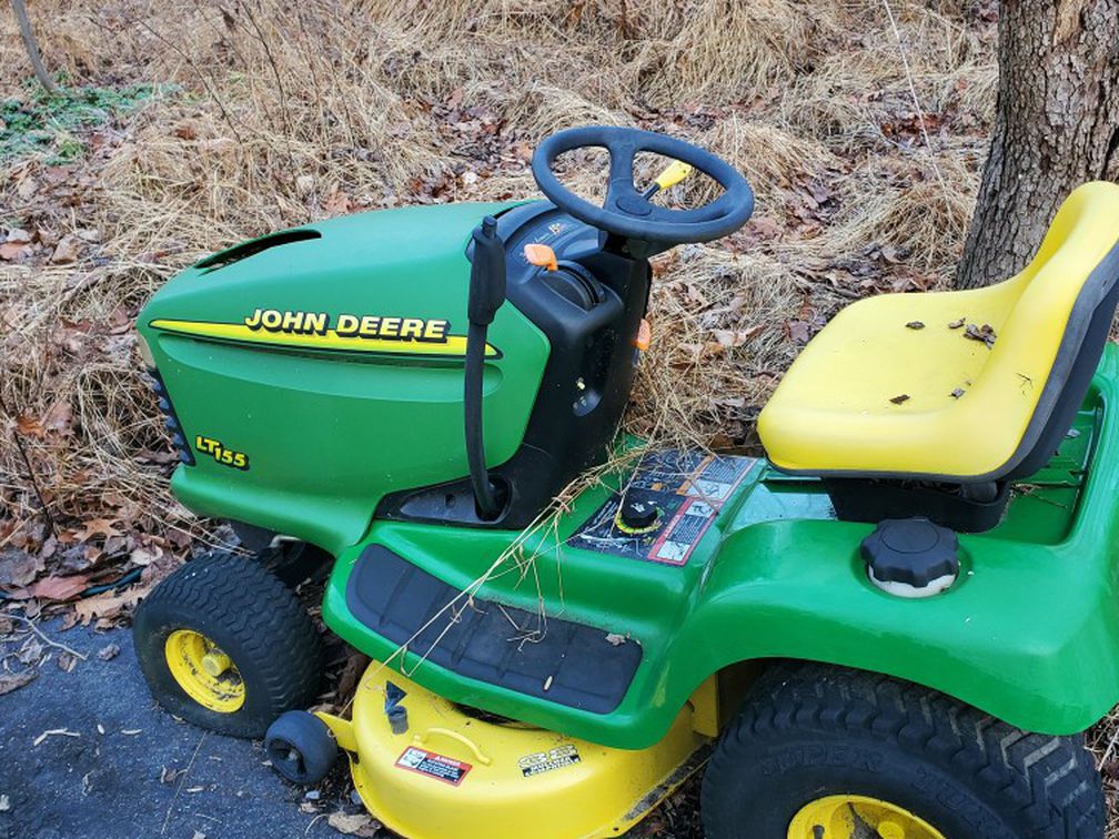 Two John Deere Riding Mowers $150/each 250 For Both