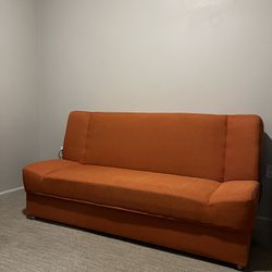 77” Upholstered futon/ with storage underneath. 