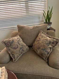 FREE UPHOLSTERED CHAIR AND MATCHING OTTOMAN