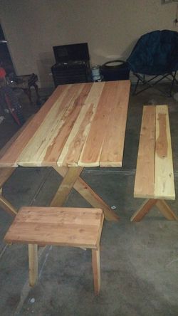5ft wooden table and seats