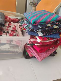 Large Assortment of Cut Quilting Fabric over 100 pieces