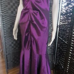 Dress I used one Time, Color purple size 12.