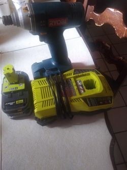 Ryobi drill, battery, and charging adapter