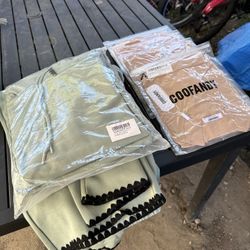 brand new unopened men’ clothes. 2 matching sweatsuit pants and hoodies. 4 stretchy long sleeve beige shirts. 