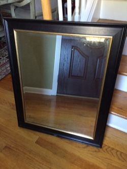 Mirror 27" by 32" the frame has a small crack