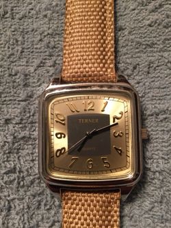Terner large face square silver tone watch with a tan leather band