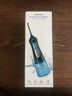 Portable oral irrigator