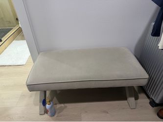 Beige upholstered bench