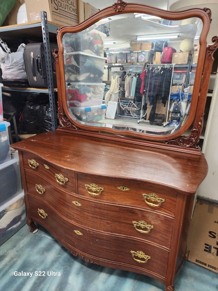 Antique dresser with mirror.  54L x 25D x 32.5H w/ mirror 68H