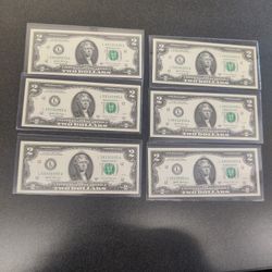 Brand new $2 fancy serial number bills, Trinary, Repeater, uncirculated etc. Total of 15 $2 Bills.