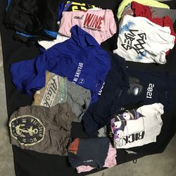 2 bolsas con camisas niño “m”