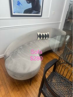 Light gray suede curved sofa