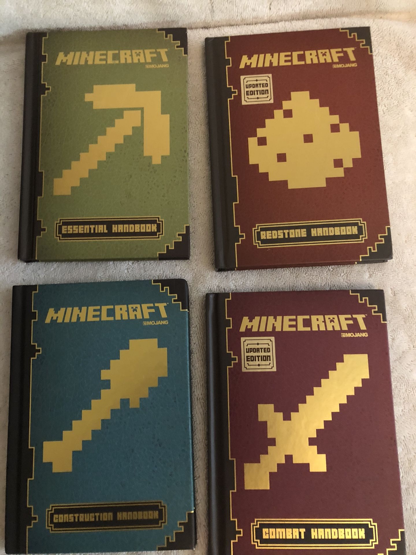 Lot of 4 Minecraft Books - Combat, Redstone, Essentials Construction Handbooks