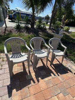 3 plastic chairs