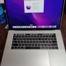 MacBook Pro 2017 15" Touch Bar Retina Intel Core i7-7th , 16gb Ram, 256gb SSD, Radeon Pro 2gb Graphics, macOS Monterey. Comes with Charger. 