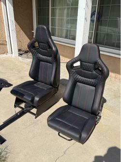 Black Racing Bucket Seat with Red Stitching and Carbon Fiber Back