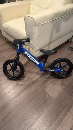 Strider blue bike