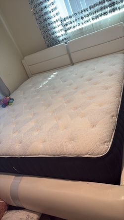 Bed with mattress