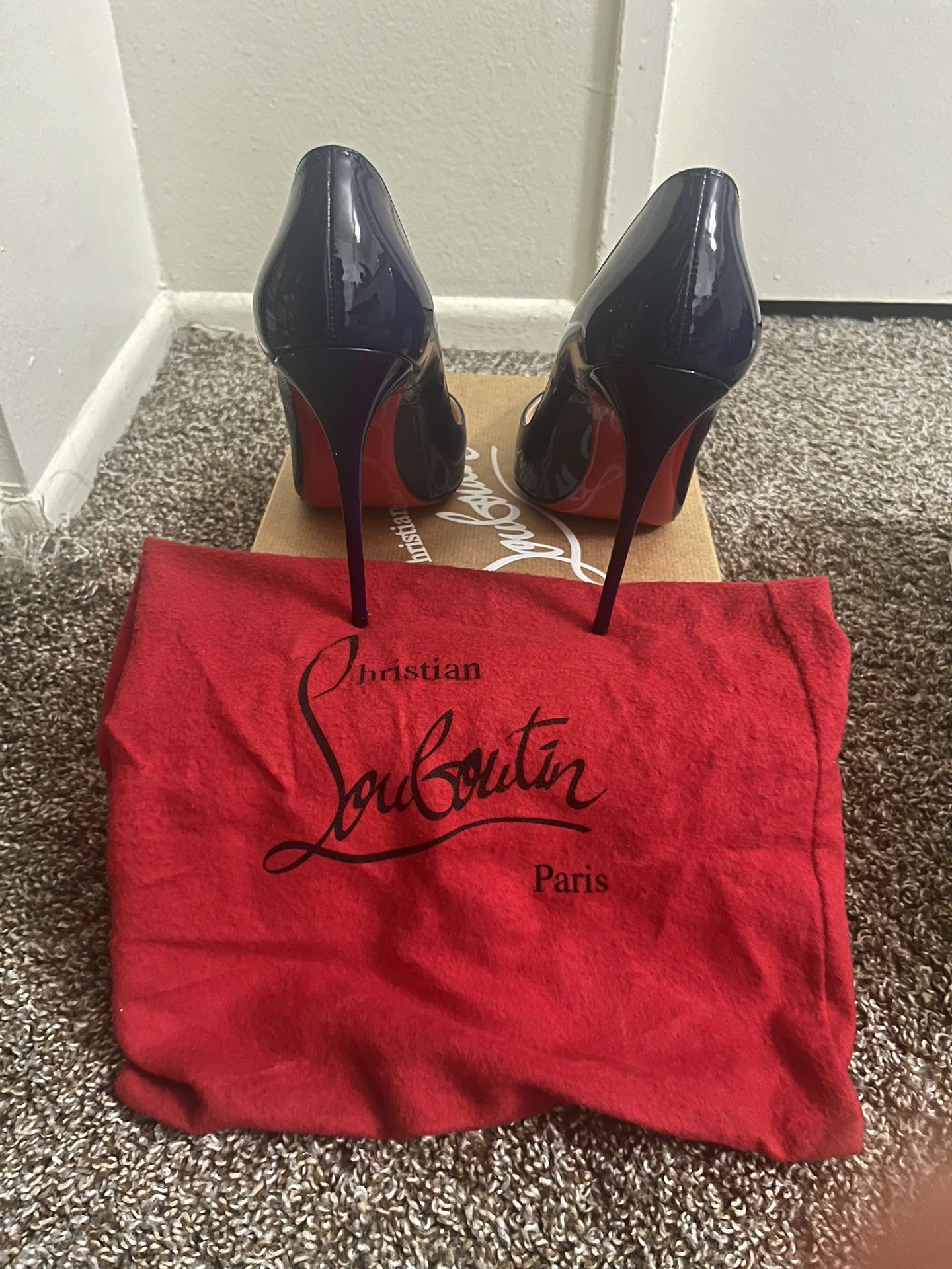 Christian Louboutin “Red bottoms”
