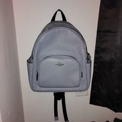 light blue Coach backpack