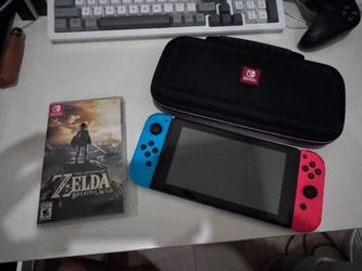Nintendo Switch with carrier case and Zelda: Breath of the Wild