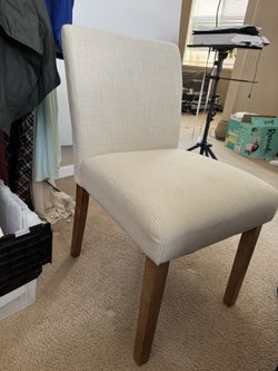 Beige Chair With Brown Legs