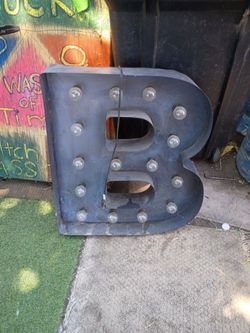 Big letter B lights up