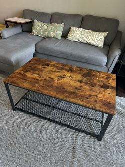 Coffee table with storage shelf