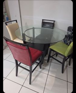 Glass Top Counter Height Table.. + 4 Chairs
