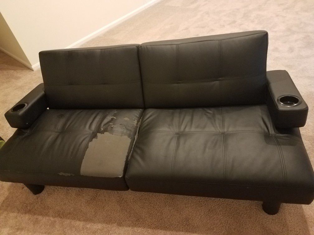 Black leather sofa bed