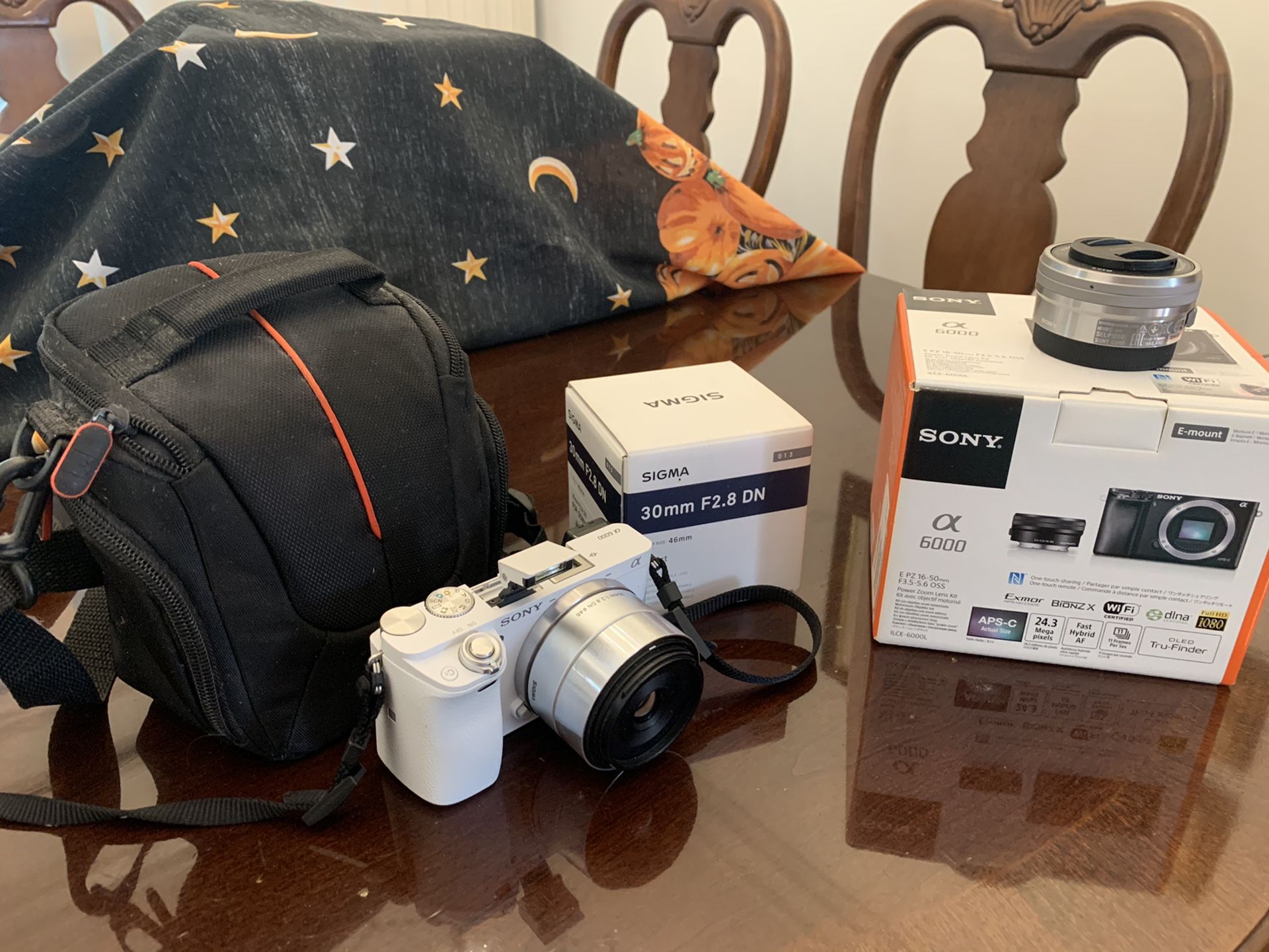 Sony a6000 package with kit lense and sigma 30mm