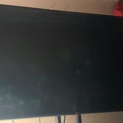 65 Inch TV With Sharp Sound System And Mobile TV Stand