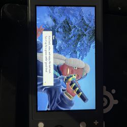 Nintendo Switch Lite With Pokémon Scarlet
