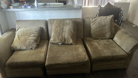 Three piece couch, gold blackish with pillows