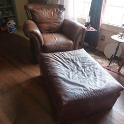 Is gorgeous Brown  Oversized leather chair and ottoman $100 for both