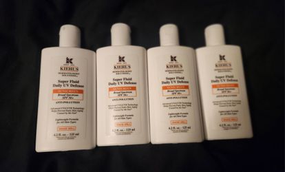 4 Kiehl's Super Fluid Daily UV Defense,  4.2 fl oz,  look at pictures for expiration date