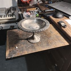  a vintage weighted sterling silver or silverplate compote, also known as a pedestal dish or candy dish. 