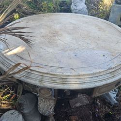 Solid rustic looking table free very heavy about 4feet wide 2+ feet tall