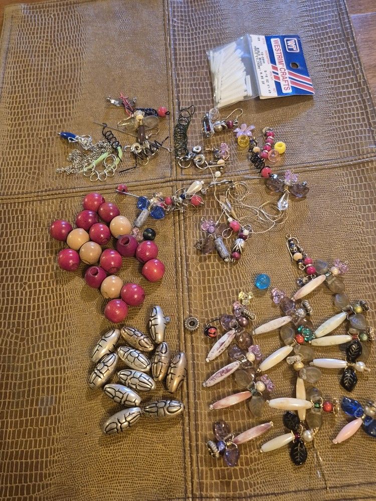 Assortment of craft supplies Beads earrings pins