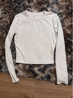 White long sleeve tee- perfect shape -size Large $5 cash. Pickup at Ellsworth and Guadalupe in East Mesa