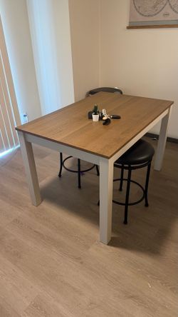 Brown and white Ikea Dining table