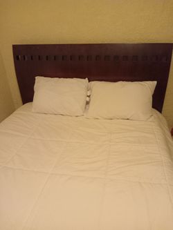 Wooden strong queen bed frame.