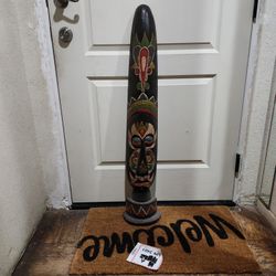 hand-painted Indonesian face mask sculpture. 