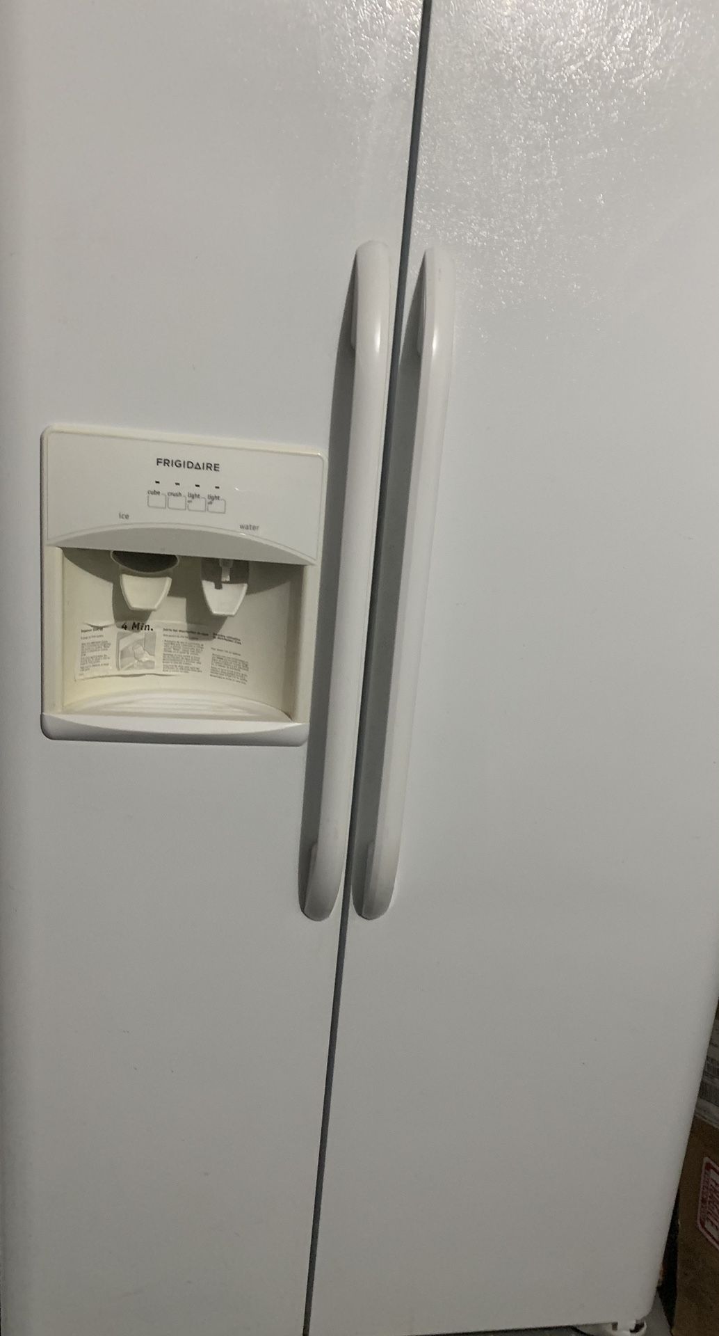 Side By Side White Frigidaire Refrigerator