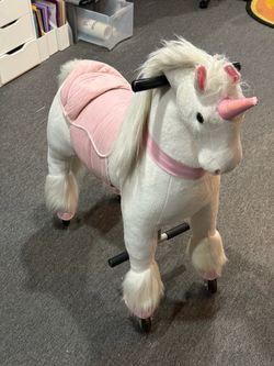 White pink unicorn mechanical pony