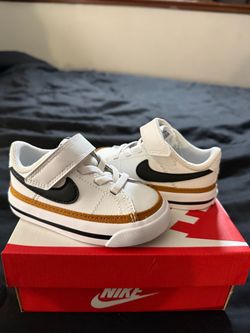 Boy legacy courts Nikes