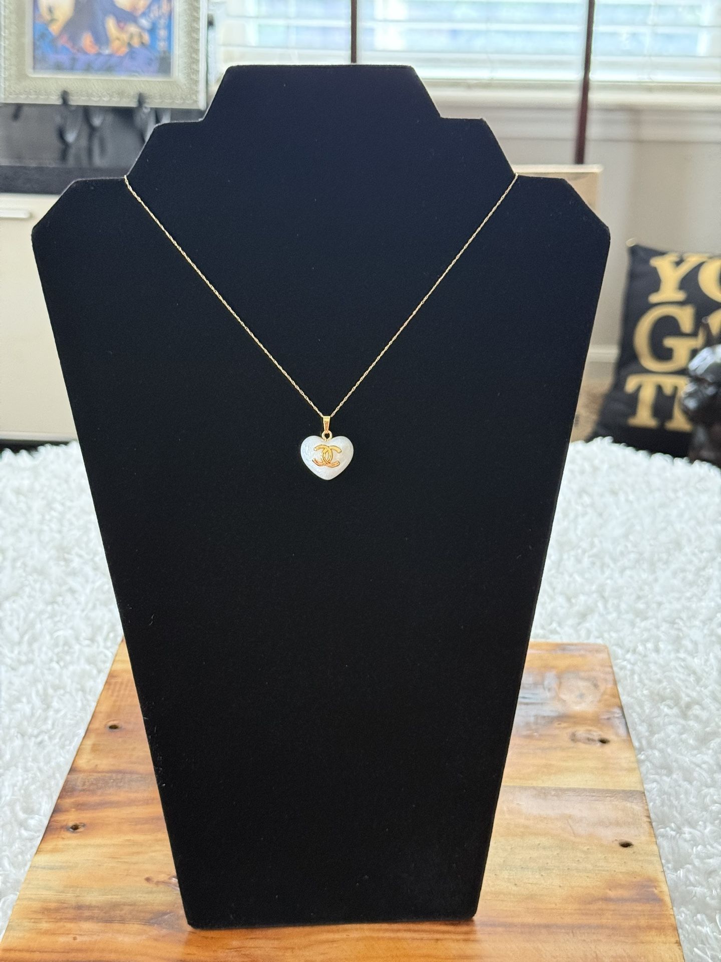 Solid Gold 10k 18” Chain stamped and tested with a white heart designer Pendant. Last One