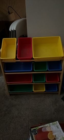 Wooden stand and 12 plastic toy storage bins