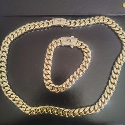 Brand new Cuban link 14k plated kneclace is 22 long bracelet is 9 long